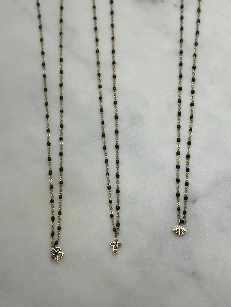 Collier Mona noir (trèfle, croix, oeil, étoile, éclair)