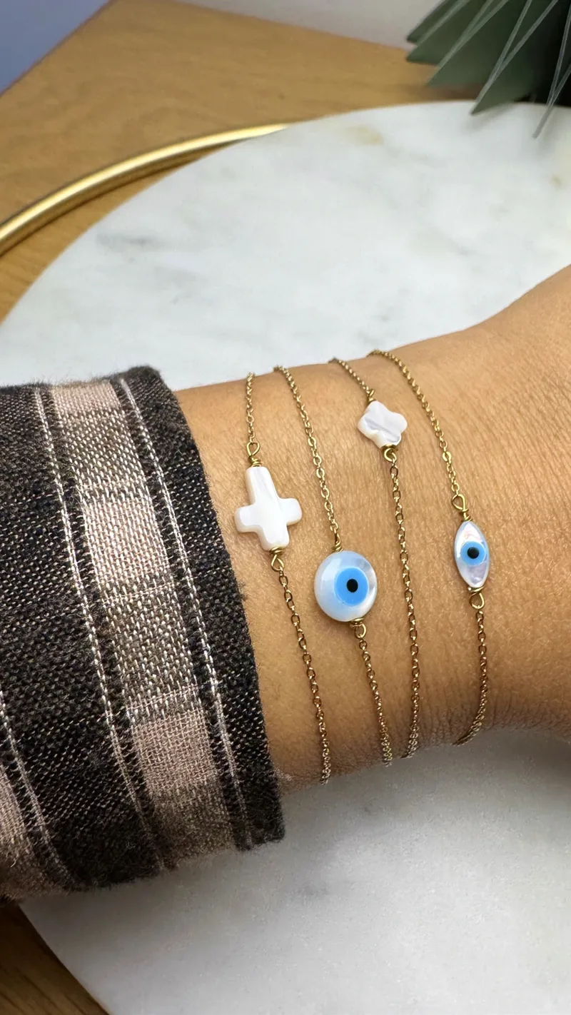 Le bracelet Melina  (croix, œil, œil long, trèfle)